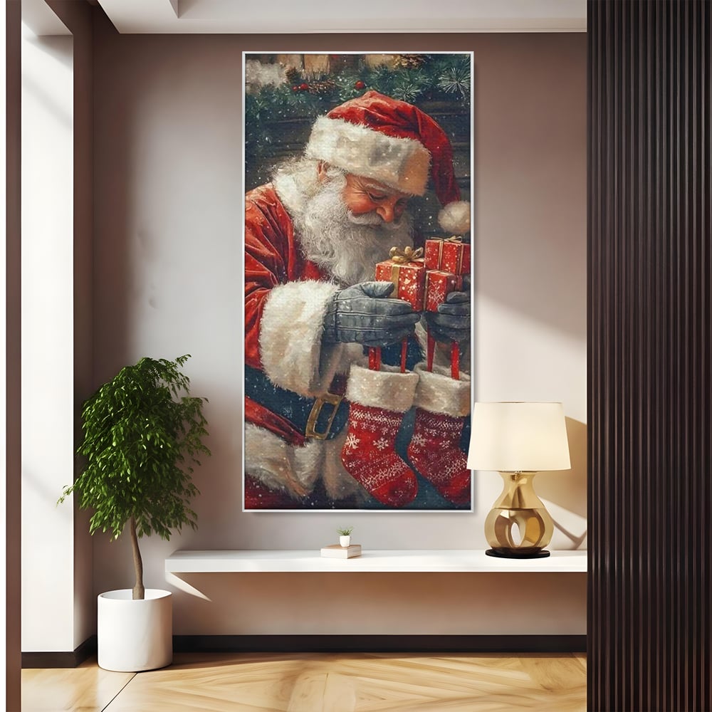 Tablou canvas cu ilustratie cu mos craciun tinand cadouri, in rama de aluminiu argintiu